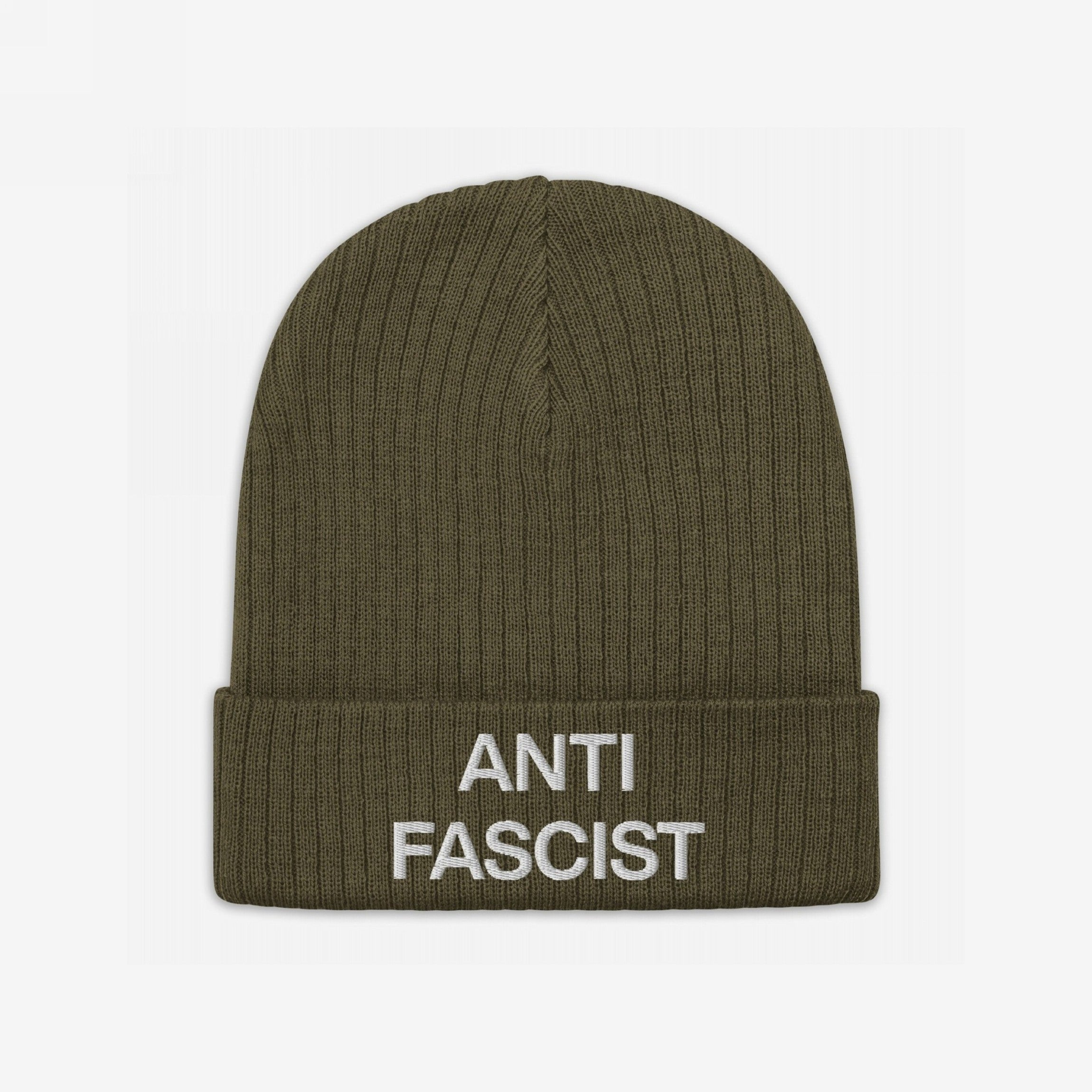 Olive-green ribbed knit beanie with ANTI FASCIST embroidered in white on the cuff. The Anti-Fascist Classic Hat embodies timeless style and strong conviction against fascism, perfect for politically conscious individuals.
