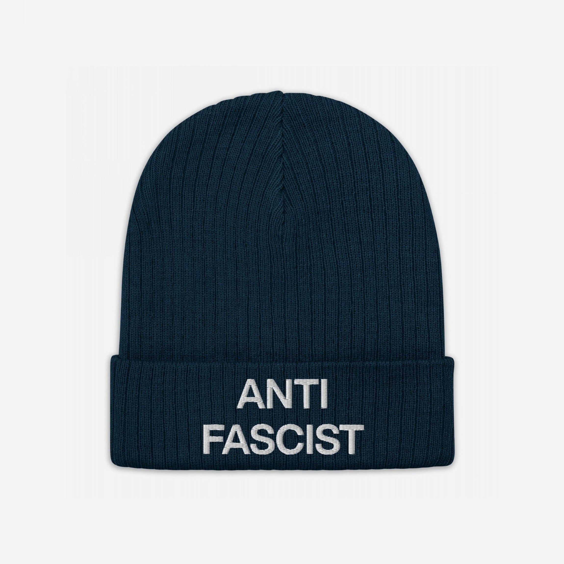 Navy-blue rib-knit beanie with ANTI FASCIST in white on the cuff, embodying the Anti-Fascist Classic Hat's bold message and timeless style. Ideal for expressing resistance with conviction.