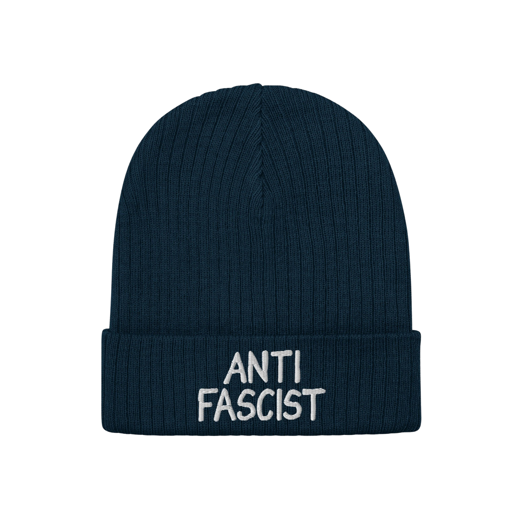 Dark navy-blue ribbed knit beanie with ANTI FASCIST embroidered in white on the cuff, embodying revolutionary style and ethic