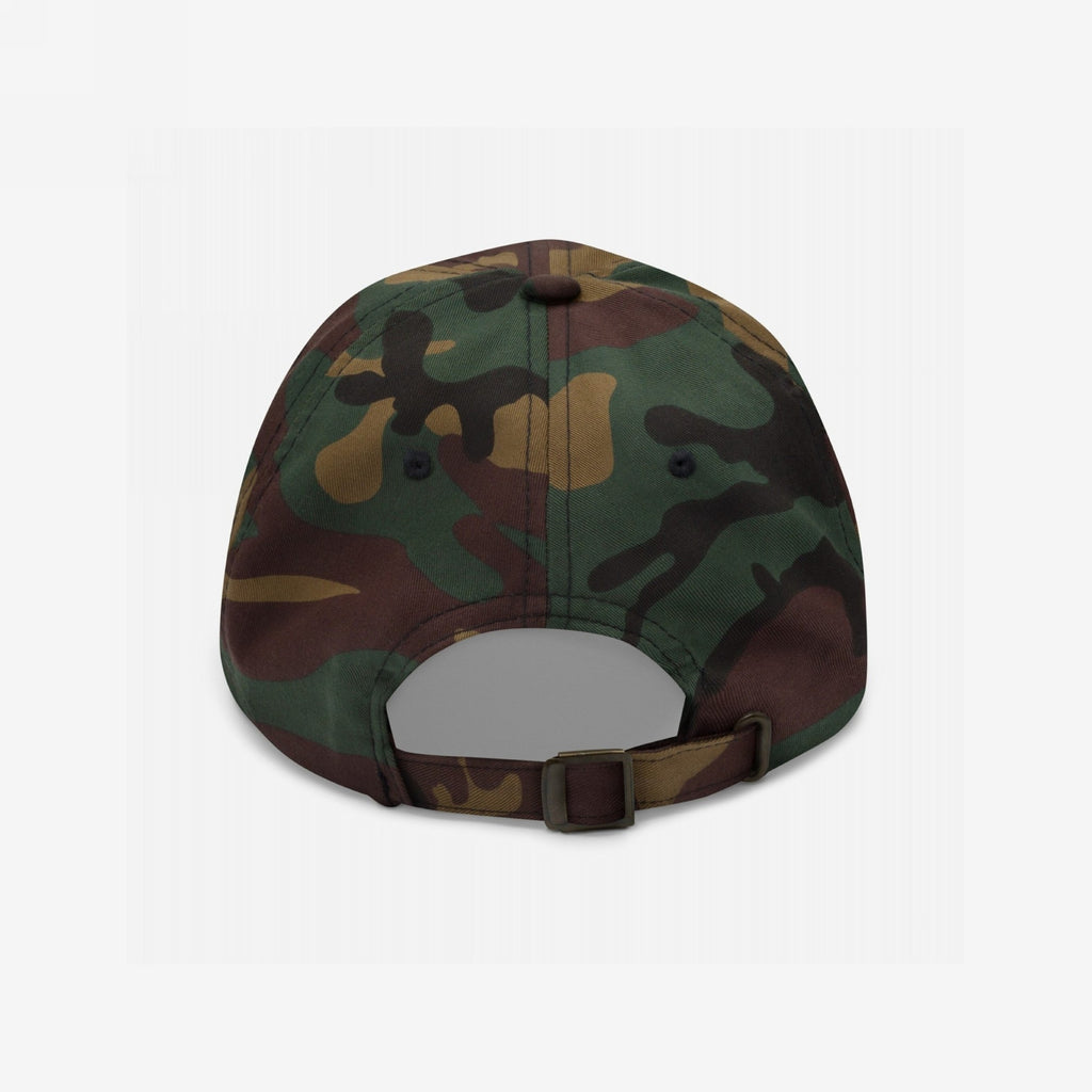 Rear view of the Anti-Fascist Classic Hat in woodland camouflage, showcasing its adjustable fabric strap, metal buckle, six-panel stitching, and ventilation eyelets, embodying a bold, resistance-driven style.
