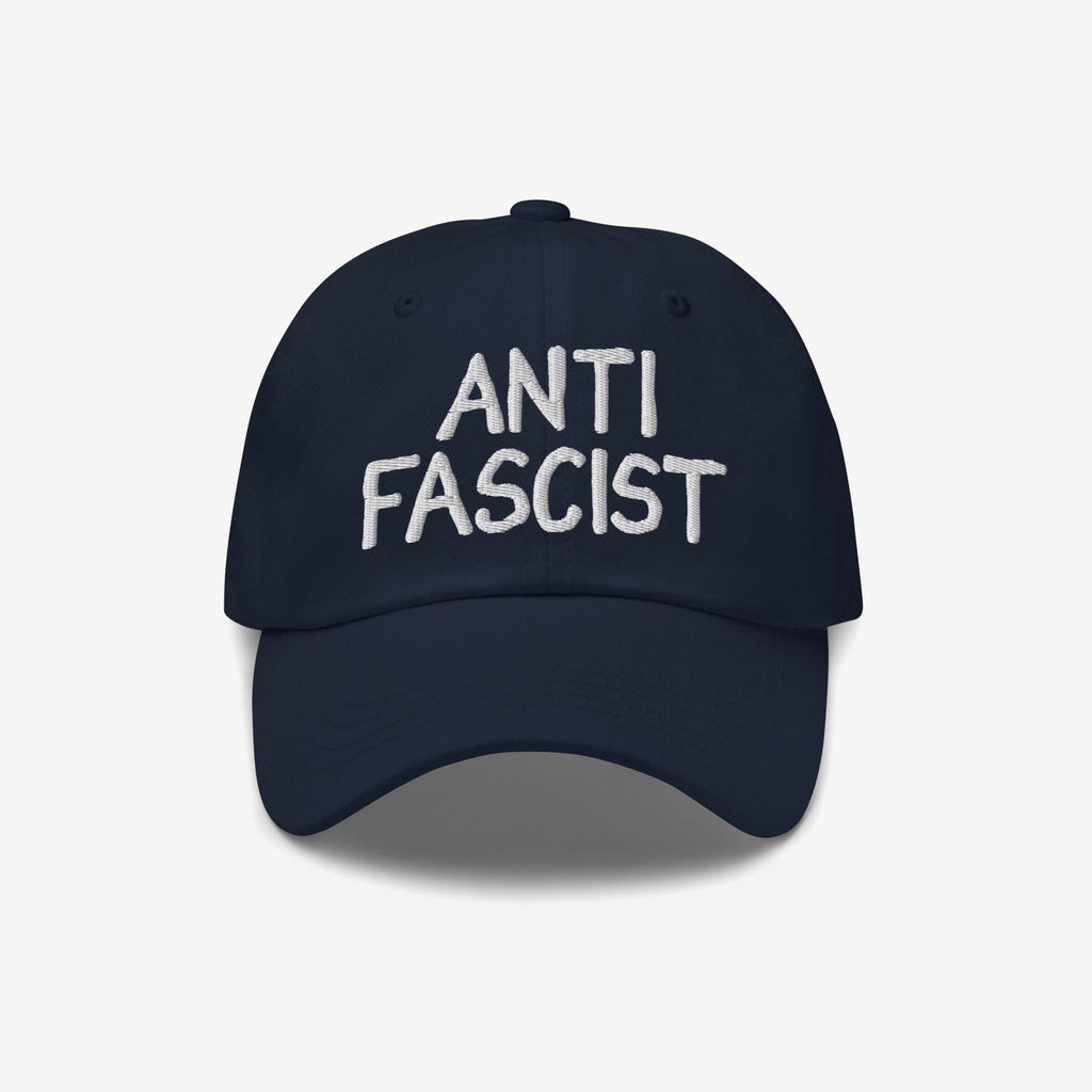 Navy-blue Anti Fascist Hat with ANTI FASCIST embroidered in white, symbolizing resistance and style. Unisex and ethically crafted, supporting ACLU, embodying a stand against fascism with everyday comfort and flair.