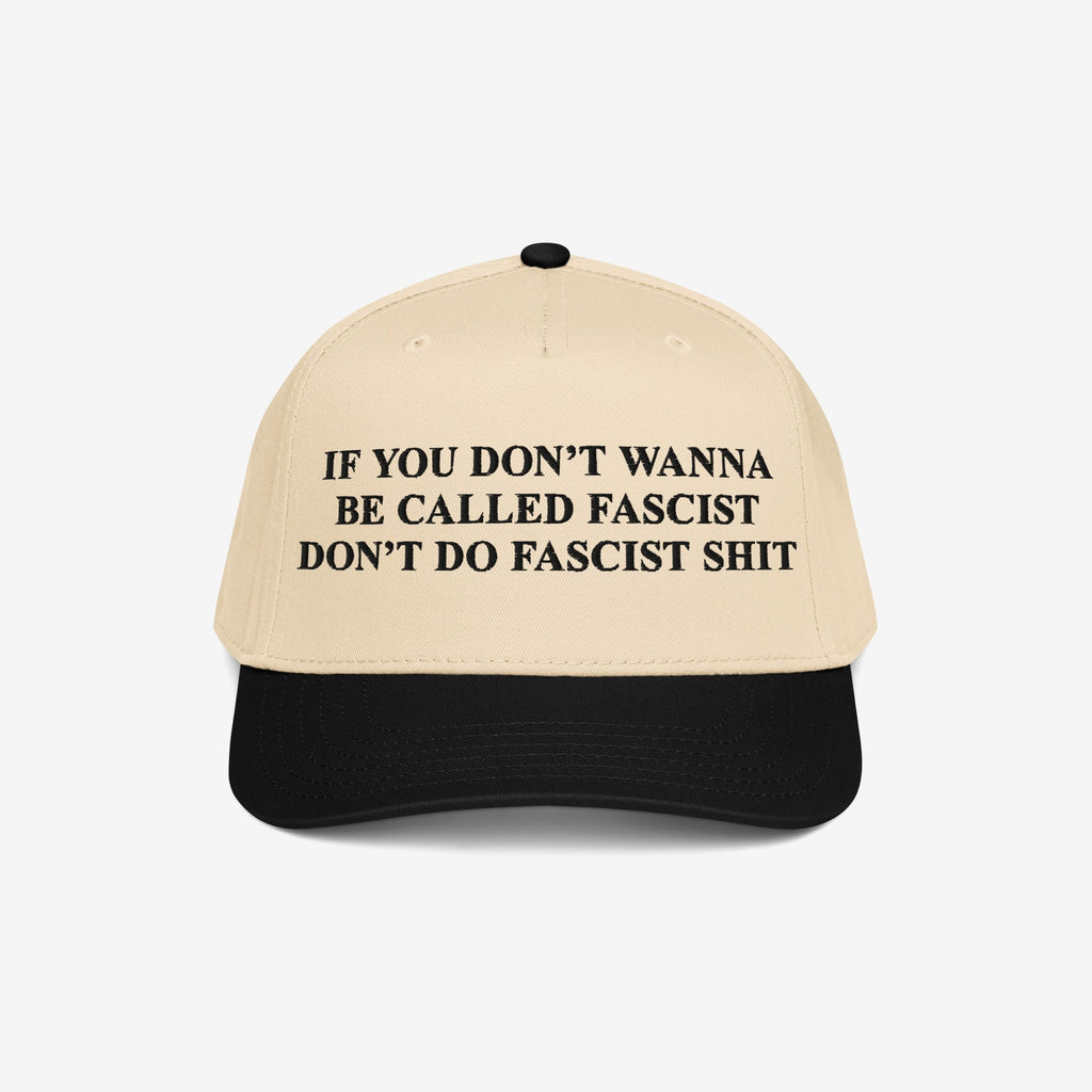 Anti-Fascist Retro 5-Panel Hat featuring a bold slogan in black text on its front panel, combining a light beige crown with a black brim, embodying fearless activism and statement-making style.