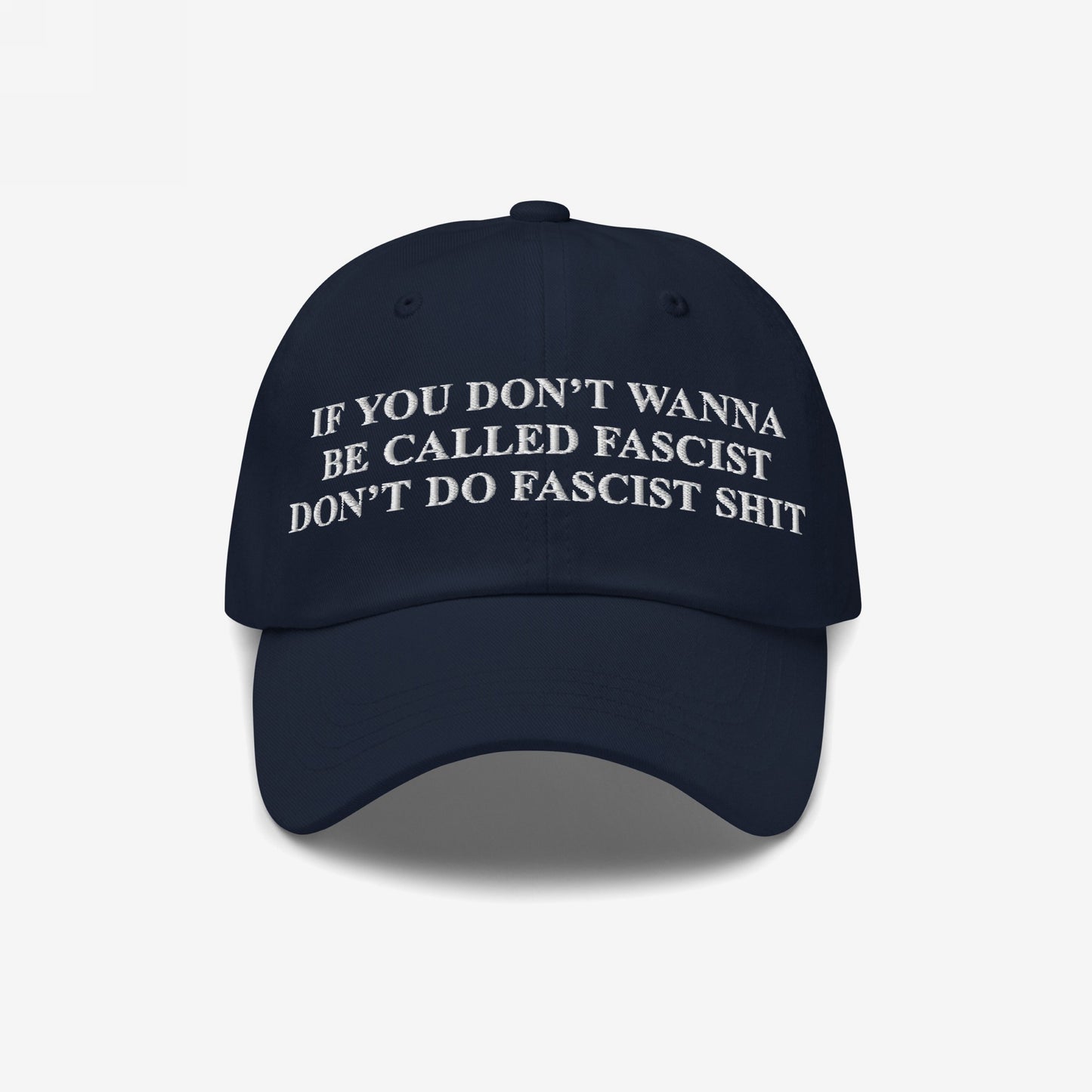 Anti-Fascist Retro Hat featuring bold, white embroidered text urging against fascism. The cap makes a strong statement, perfect for those who stand against hate and advocate for equality.