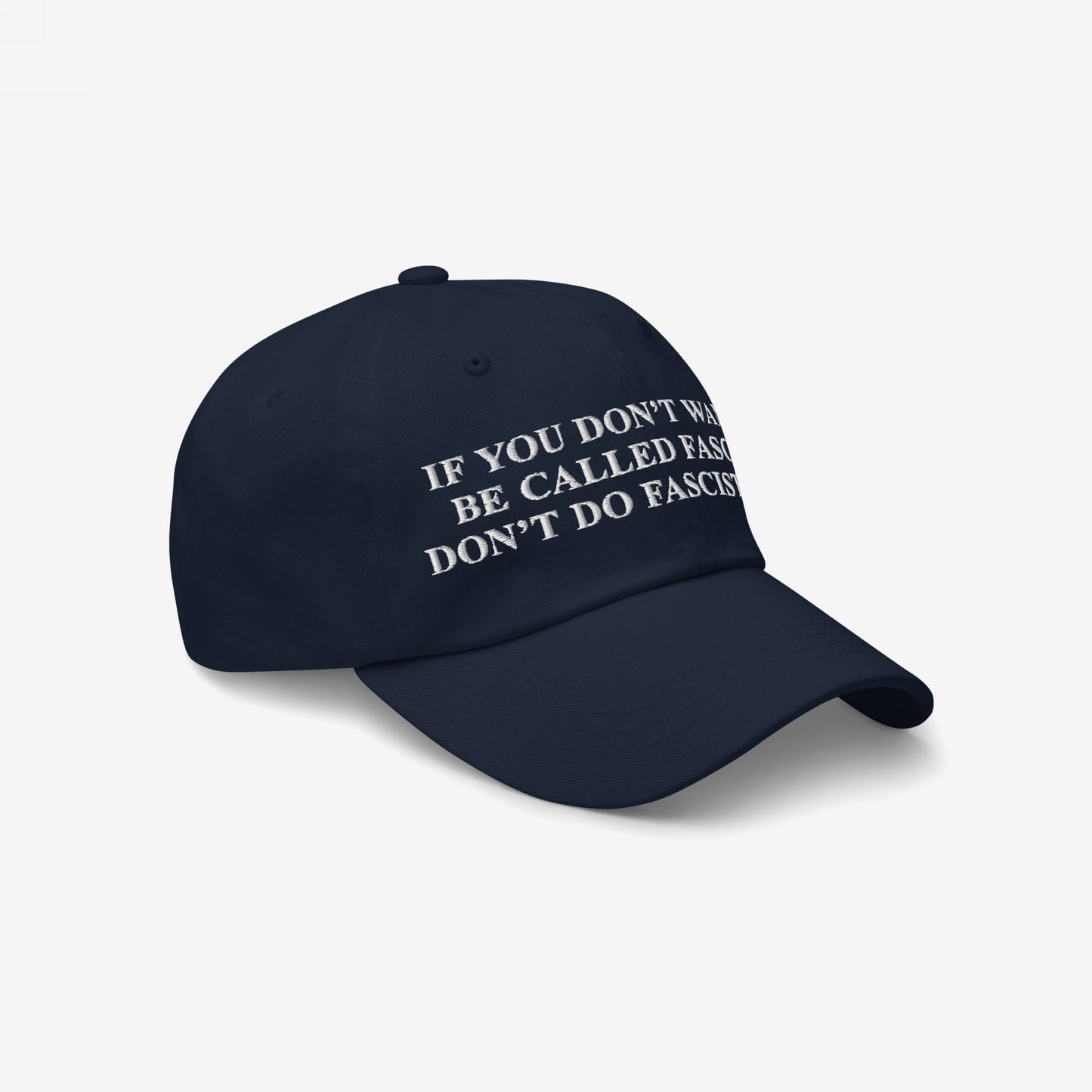 Anti-Fascist Retro Hat featuring bold white embroidered text, IF YOU DON’T WANT TO BE CALLED FASCIST DON’T DO FASCIST, on a navy baseball-style cap, expressing resistance and defiance.