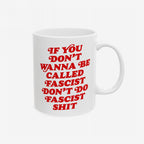 Anti-Fascist Retro Mug featuring a bold red slogan: IF YOU DON’T WANNA BE CALLED FASCIST, DON’T DO FASCIST SHIT on a white ceramic, showcasing a stand against hate.