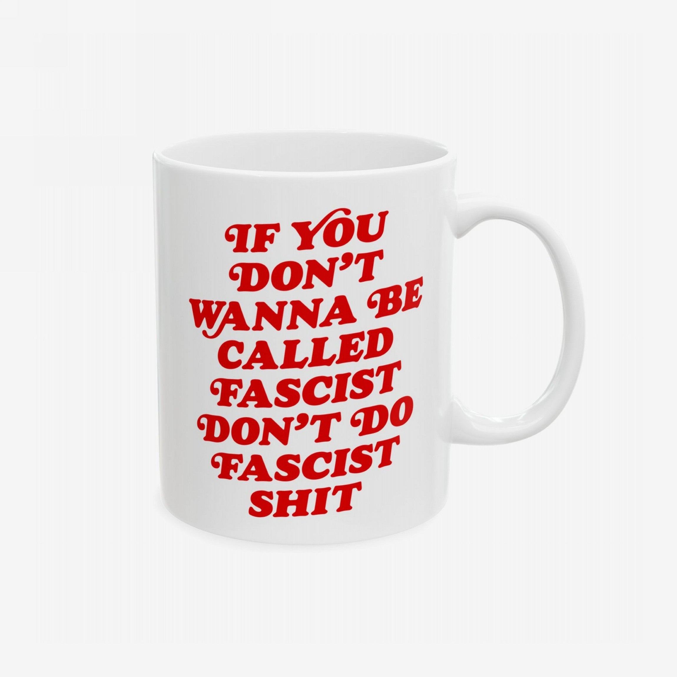 Anti-Fascist Retro Mug featuring a bold red slogan: IF YOU DON’T WANNA BE CALLED FASCIST, DON’T DO FASCIST SHIT on a white ceramic, showcasing a stand against hate.