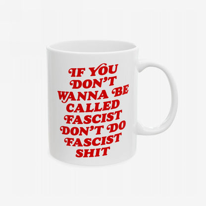 Anti-Fascist Retro Mug featuring a bold red slogan: IF YOU DON’T WANNA BE CALLED FASCIST, DON’T DO FASCIST SHIT on a white ceramic, showcasing a stand against hate.