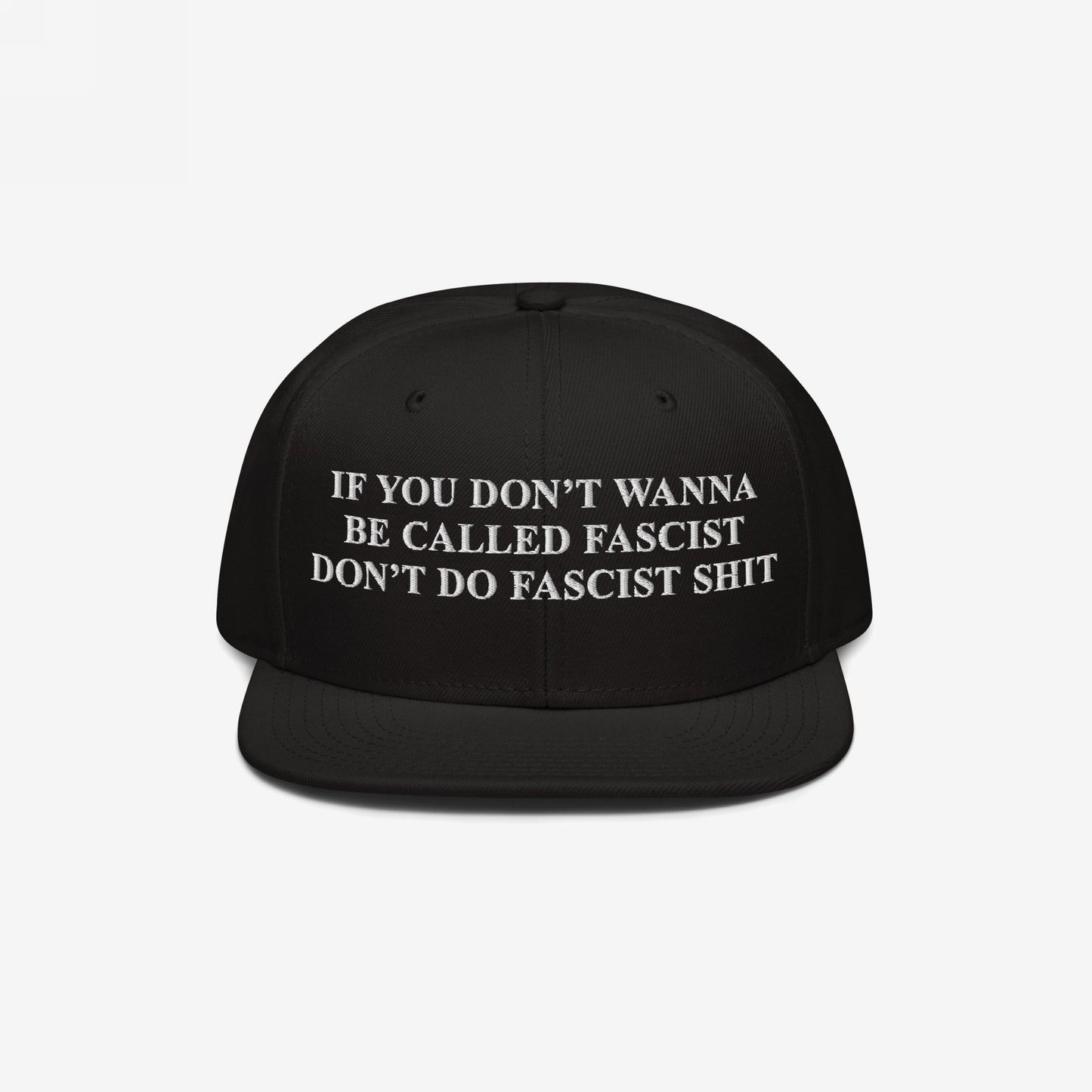 Anti-Fascist Retro Hat with bold white embroidery: IF YOU DON’T WANNA BE CALLED FASCIST DON’T DO FASCIST SHIT. This statement piece speaks against hate, perfect for assertive, conscientious fashion.