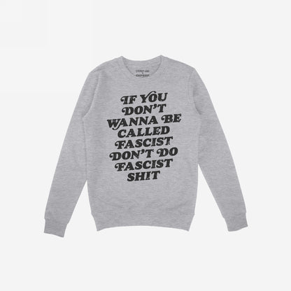 Anti-Fascist Retro Hoodie & Sweatshirt features a light-grey crewneck with bold black lettering stating, If you don’t wanna be called fascist don’t do fascist shit. Label reads STRANGE GANG x EGOPROOF.