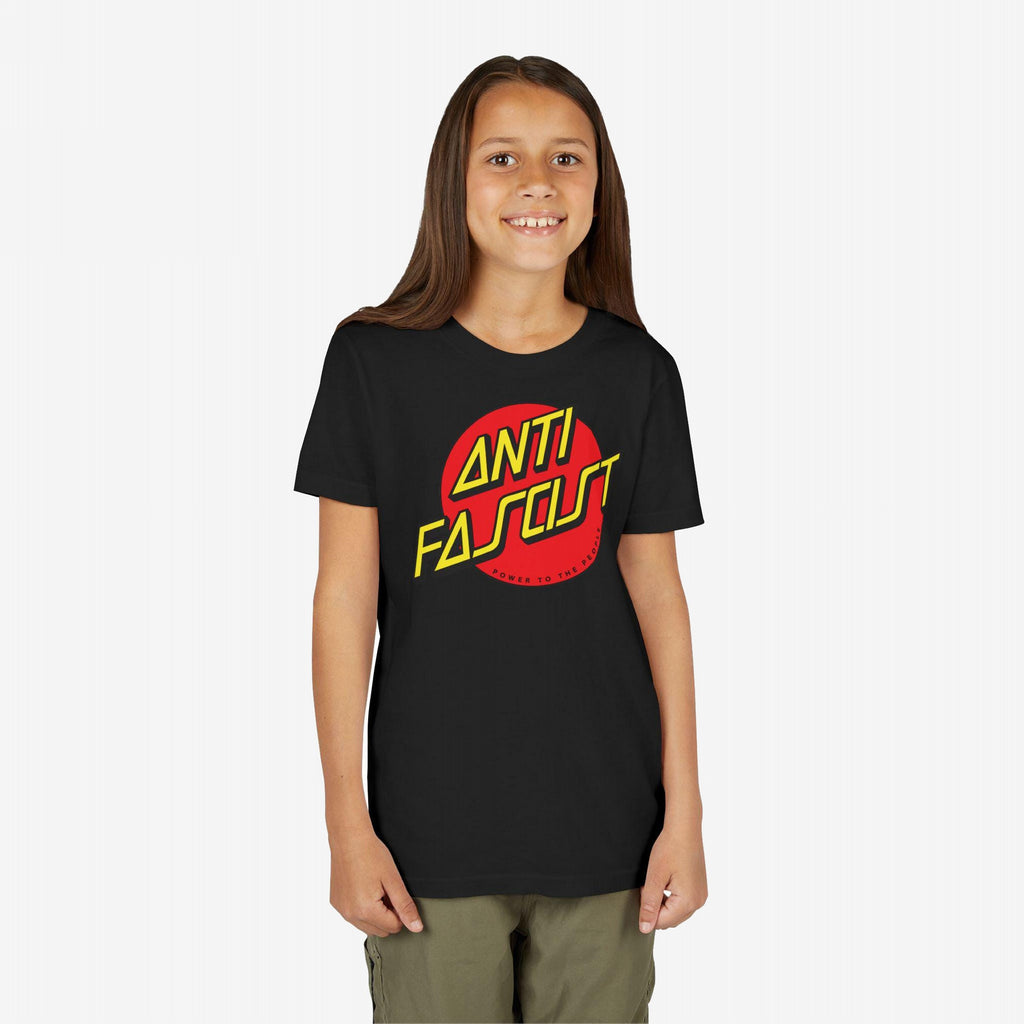 Pre-teen in a black Anti Fascist Shirt with Power to the People text, embodying skate style and progressive resistance, ideal for rallies or everyday wear. Supports ACLU with each purchase.