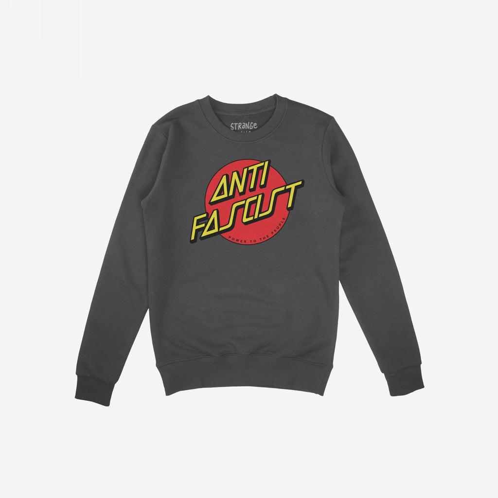 Anti Fascist Shirt: Unisex charcoal-gray sweatshirt with a bold red circle graphic on the chest, featuring yellow ANTI FASCIST text and POWER TO THE PEOPLE tagline, supporting ACLU.