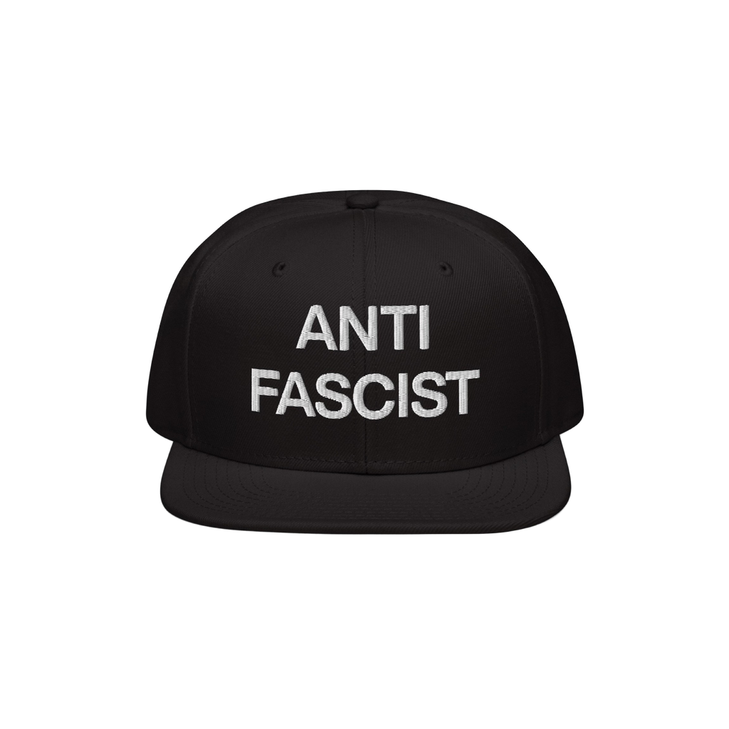 Black flat-bill cap with “ANTI FASCIST” in white block letters, embodying the Anti-Fascist Classic Hat's bold message and