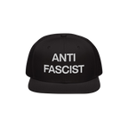 Black flat-bill cap with “ANTI FASCIST” in white block letters, embodying the Anti-Fascist Classic Hat's bold message and
