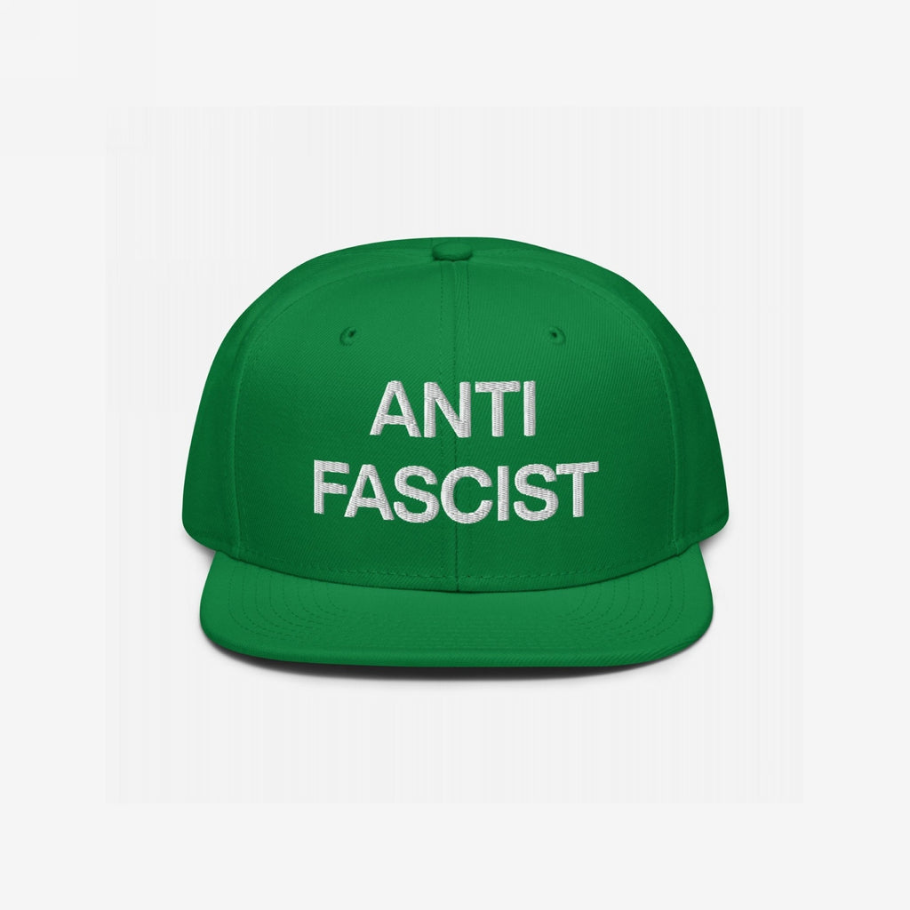 Anti-Fascist Classic Hat: Green snapback with ANTI FASCIST in bold white embroidery, embodying resistance and conviction. Perfect for those advocating against fascism with straightforward style and integrity.