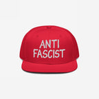 Anti Fascist Hat with white ANTI FASCIST embroidery on a red, flat-brimmed cap, embodying style and activism, supporting ethical fashion and the ACLU.