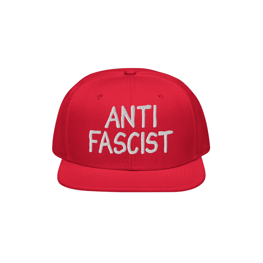 Anti Fascist Hat with white ANTI FASCIST embroidery on a red, flat-brimmed cap, embodying style and activism, supporting ethi
