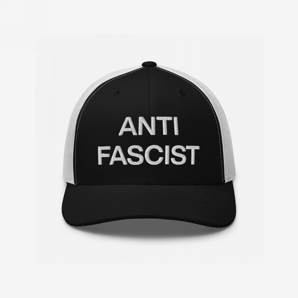 Anti-Fascist Classic Hat featuring bold ANTI FASCIST embroidery on a black front and brim, with a white mesh back, embodying resistance and style.