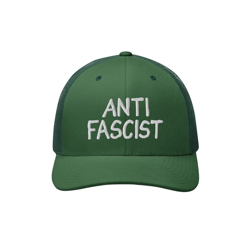 Green mesh-back trucker cap with a solid front panel, featuring ANTI FASCIST in bold white embroidery, symbolizing resistance