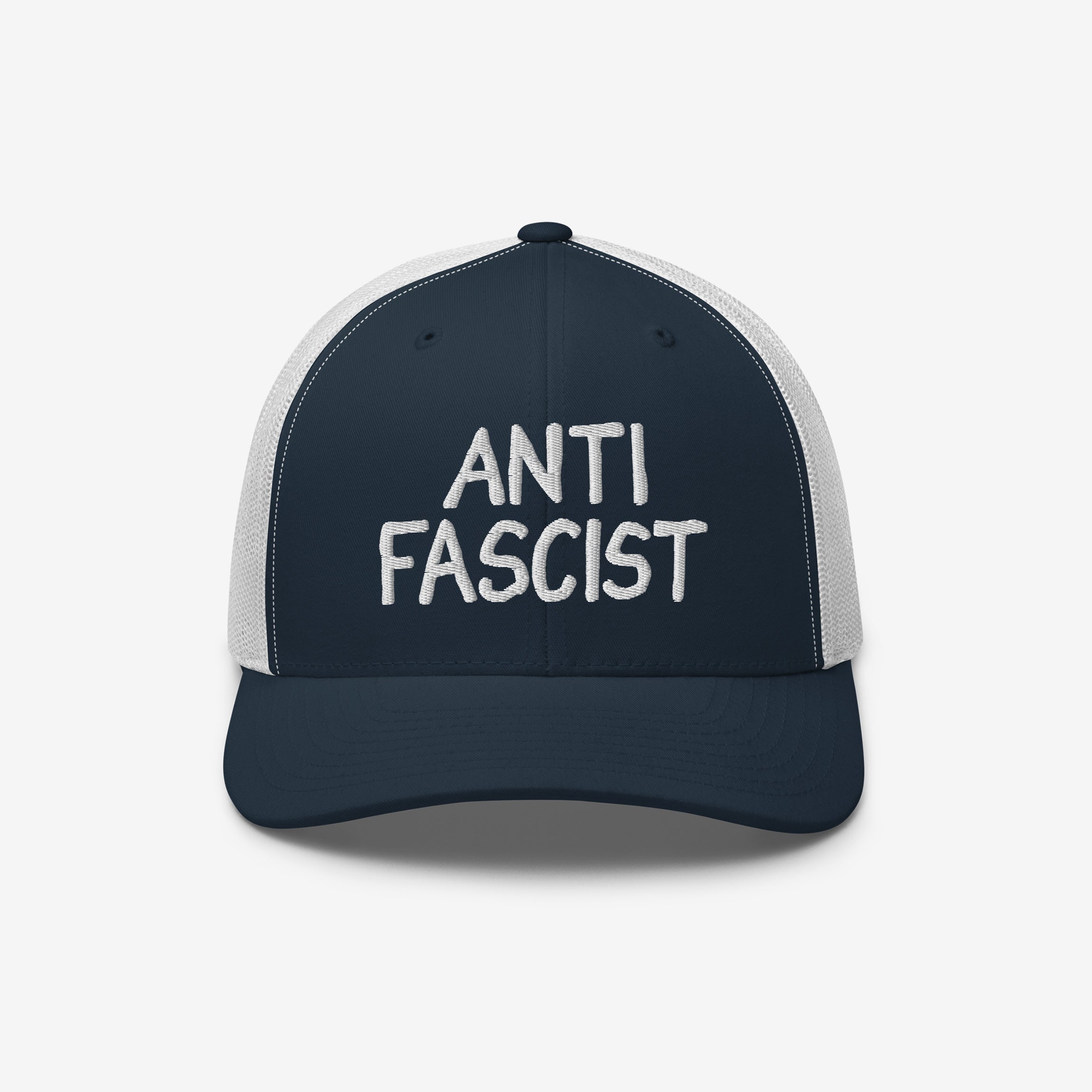 Navy-blue and white mesh trucker hat with “ANTI FASCIST” embroidered on the front, embodying style and resistance. Unisex design, ethically made, supporting the ACLU's mission against fascism.