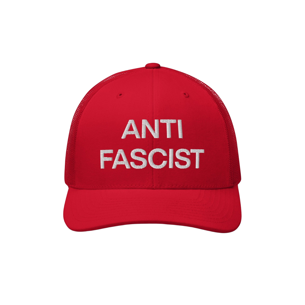 The Anti-Fascist Classic Hat features bold, white embroidered ANTI FASCIST lettering on a red trucker-style cap, embodying a 