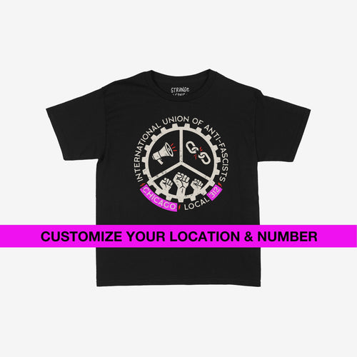 Custom Anti-Fascist Union Kids T-shirt featuring a circular logo with megaphone, broken chain, and raised fists. Text reads “INTERNATIONAL UNION OF ANTI-FASCISTS” with customizable city name and chapter number.