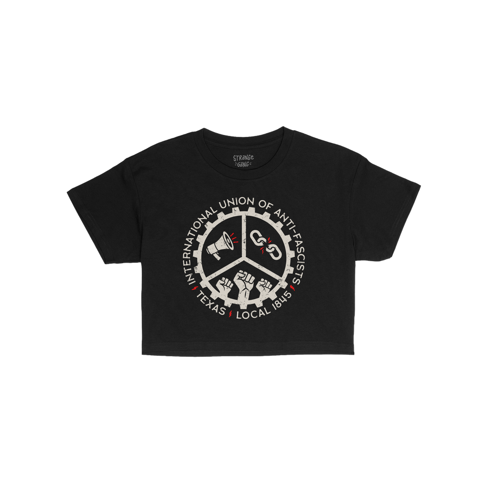 Texas Anti-Fascist Union Women's Baby Tee featuring a distressed, vintage-style graphic with a gear showing a megaphone, brok