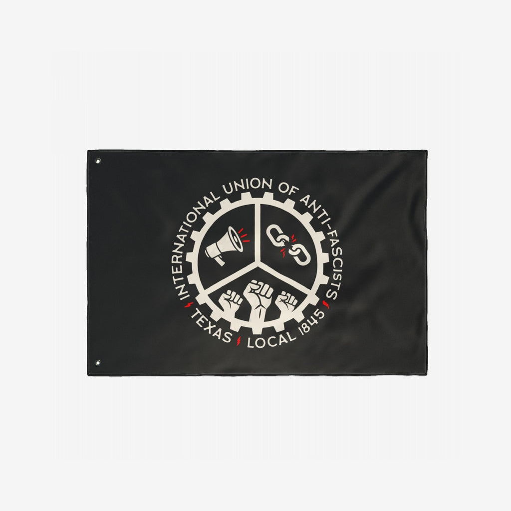 Custom Anti-Fascist Union Flag featuring a circular gear emblem with symbols of protest: a megaphone, broken chain, and raised fists. Text reads “INTERNATIONAL UNION OF ANTI-FASCISTS and “TEXAS LOCAL 1845.”