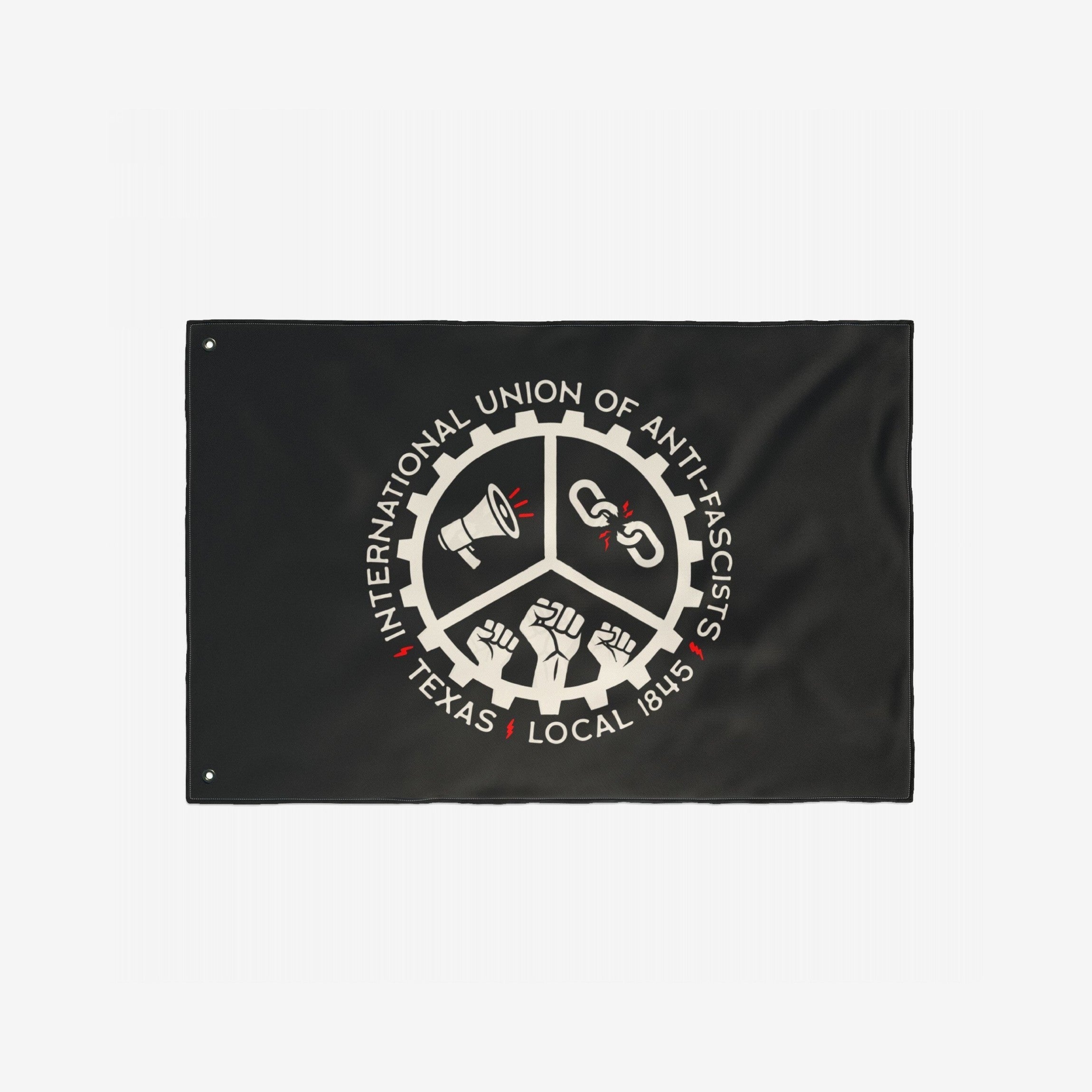 Custom Anti-Fascist Union Flag featuring a circular gear emblem with symbols of protest: a megaphone, broken chain, and raised fists. Text reads “INTERNATIONAL UNION OF ANTI-FASCISTS and “TEXAS LOCAL 1845.”