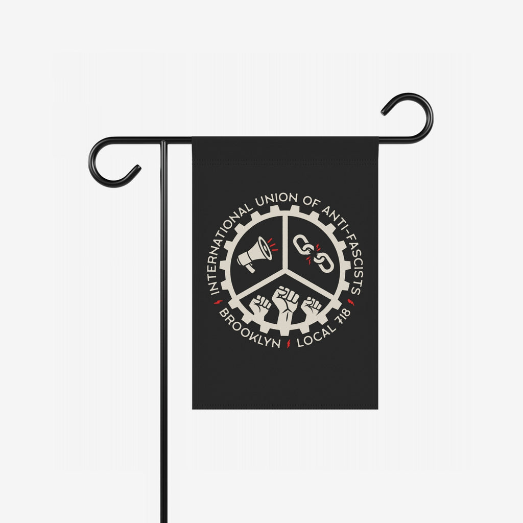 Brooklyn Anti-Fascist Union Garden Flag featuring a gear emblem with a megaphone, broken chains, and raised fists, highlighting anti-fascist solidarity. Text reads International Union of Anti-Fascists, Brooklyn Local 718.