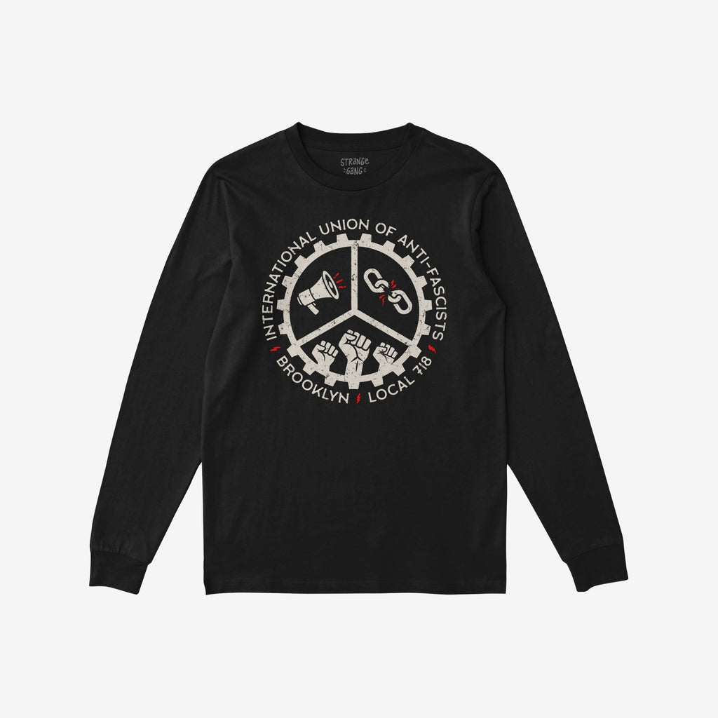 Brooklyn Anti-Fascist Union T-shirt featuring a distressed circular emblem with symbols of resistance: megaphone, broken chain, and raised fists, embodying solidarity against fascism.