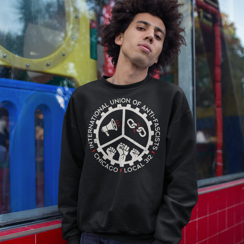 Custom Anti-Fascist Union Sweatshirt with gear emblem featuring a megaphone, broken chains, and raised fists. INTERNATIONAL UNION OF ANTI-FASCISTS and CHICAGO • LOCAL 3/2 encircle the design.