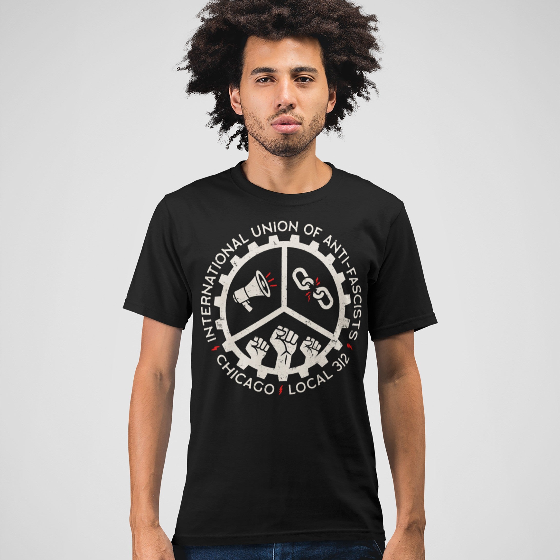 Custom Anti-Fascist Union T-shirt featuring a vintage-style emblem with megaphone, broken chains, and raised fists. Ideal for local activists committed to anti-fascism, with personalization options for location and chapter.