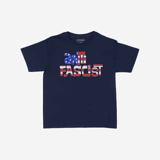 Anti-Fascist USA Women's Baby Tee features a bold “ANTI FASCIST” slogan with a stars-and-stripes motif, embodying defiance and activism with its striking, hand-drawn design. Perfect for making a statement.
