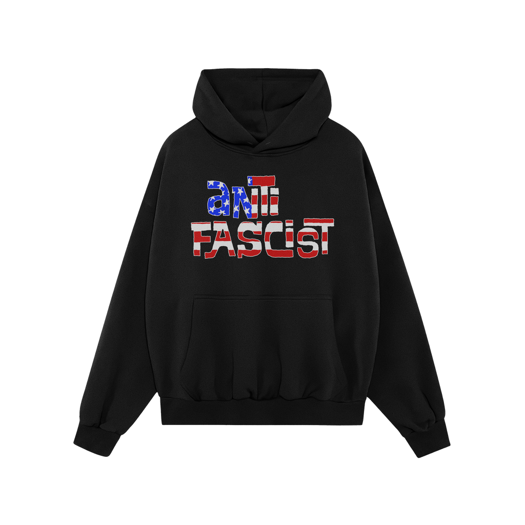 Black hoodie featuring the Anti Fascist USA Shirt graphic, with a distressed American flag motif. Designed for activism and p