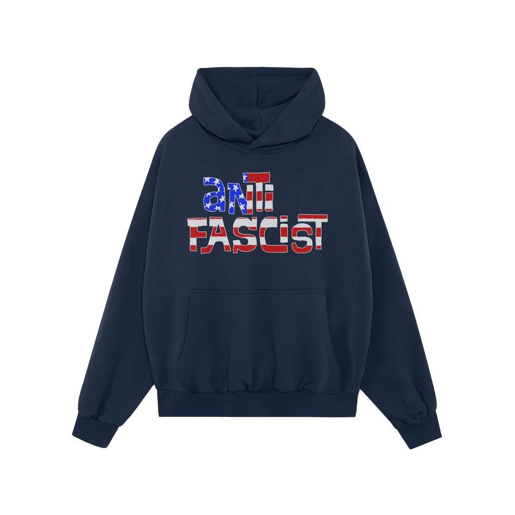 Anti Fascist USA Shirt features a dark navy-blue hoodie with “ANTIFASCIST” in a stars-and-stripes stencil design, symboli