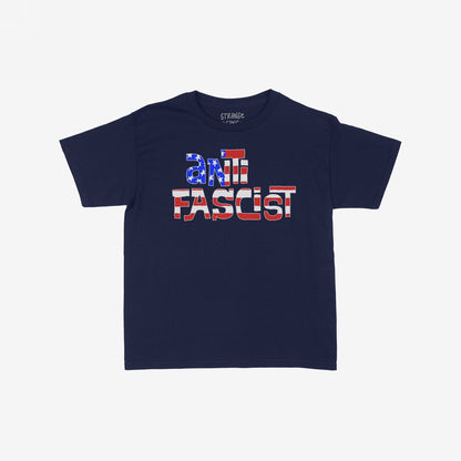 Anti-Fascist USA T-shirt showcasing a navy-blue design with ANTI FASCIST in star-and-stripe motif block letters, embodying resistance and justice. Ideal for organizers and truth-tellers advocating equality.