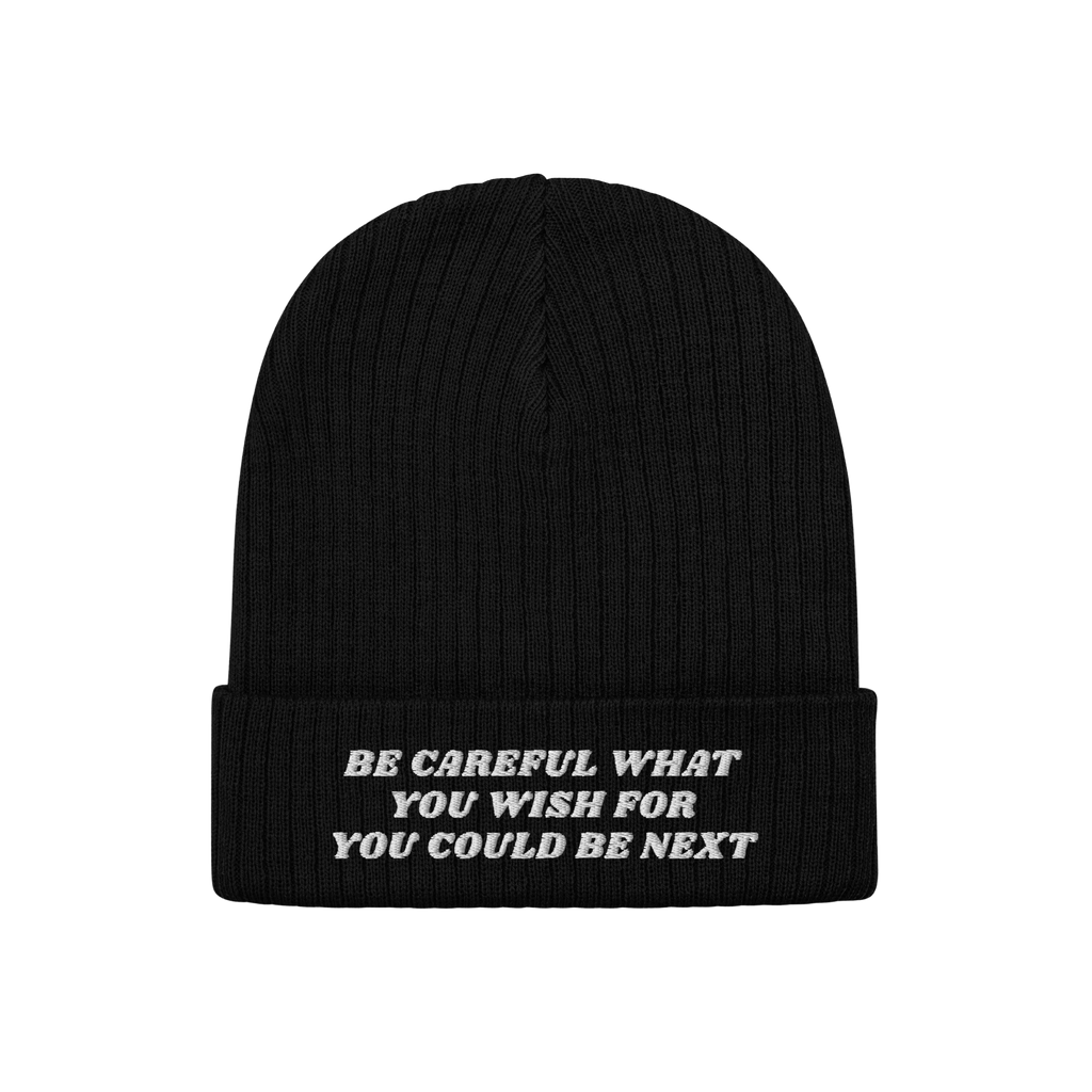 Anti-Racist Hat featuring a bold message in white block letters on a black rib-knit beanie with a folded cuff, challenging ra