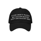 Black Anti-Racist Hat with bold white text stating, If you don’t wanna be called racist, don’t do racist shit, embodying 