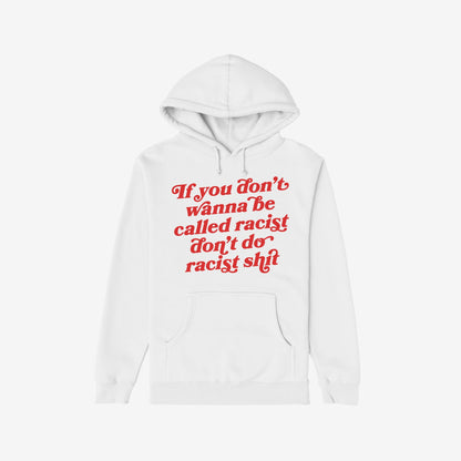 Anti-Racist Shirt: A white pullover hoodie with bold red script stating, “If you don’t wanna be called racist don’t do racist shit,” featuring a kangaroo pocket and drawstring hood.