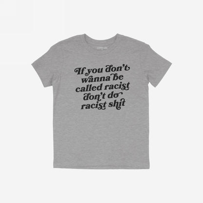 Heather-gray Anti-Racist T-shirt EU with bold black slogan: If you don’t wanna be called racist don’t do racist shit, reflecting a strong anti-racism message. Small label visible inside the neck.