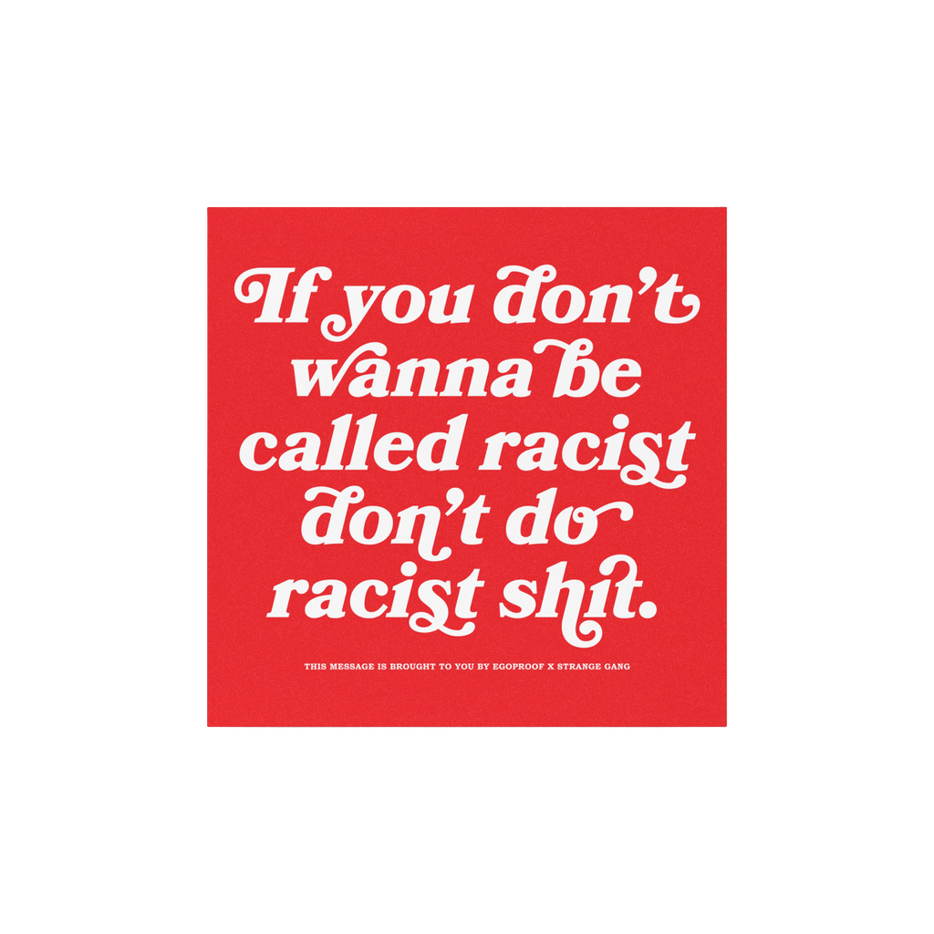 Anti-Racist Sticker & Magnet with bold message against racism, featuring white text on a red square over blurred city backdro