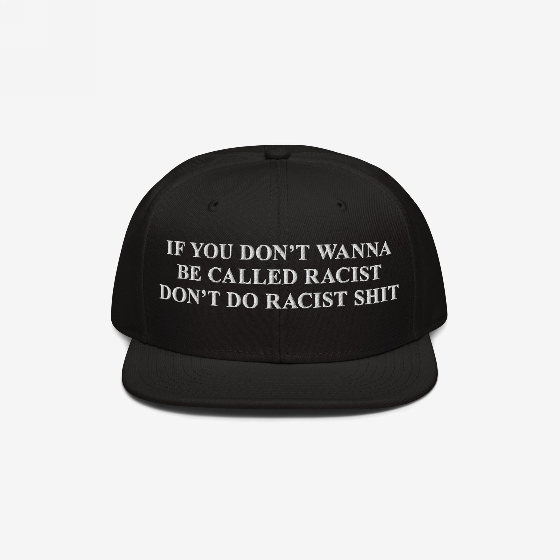 Black snap-back Anti-Racist Hat with bold white embroidery: “If you don’t wanna be called racist, don’t do racist shit,” reflecting a firm stance against racism and promoting equality.