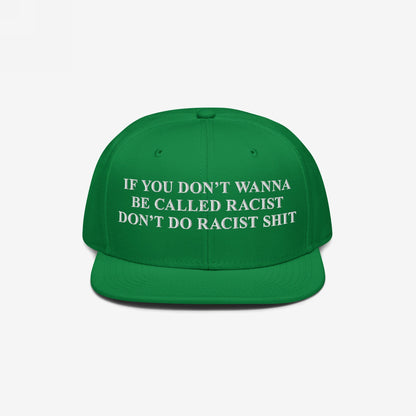 Anti-Racist Hat: A bold, green snapback cap featuring an impactful message in white embroidery, urging accountability by stating, If you don’t wanna be called racist, don’t do racist shit.