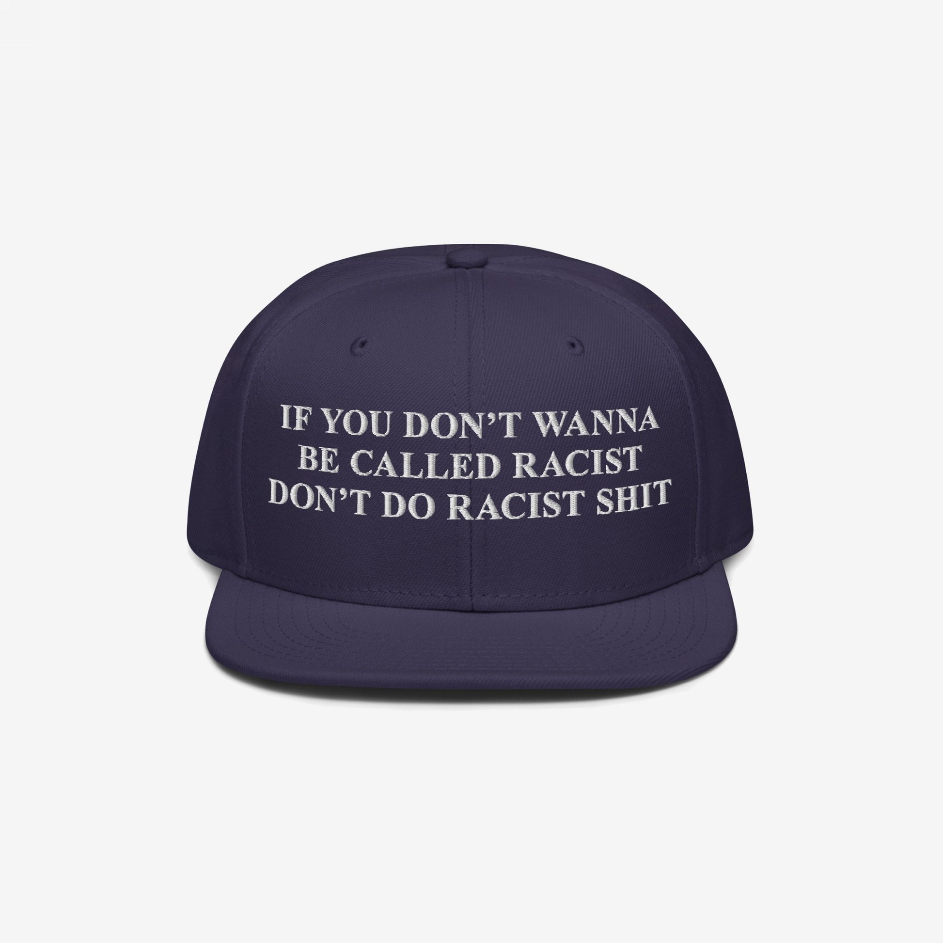 Dark navy Anti-Racist Hat with bold white text, “If you don’t wanna be called racist don’t do racist shit,” highlighting a strong stance against racism and calling for accountability.