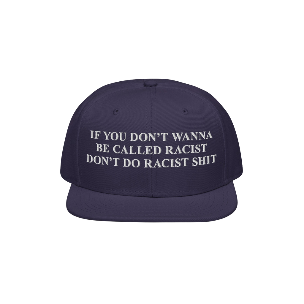 Dark navy Anti-Racist Hat with bold white text, “If you don’t wanna be called racist don’t do racist shit,” highlight