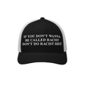 Anti-Racist Hat featuring bold white embroidered text on a black-and-white trucker cap. The message strongly opposes racism, 