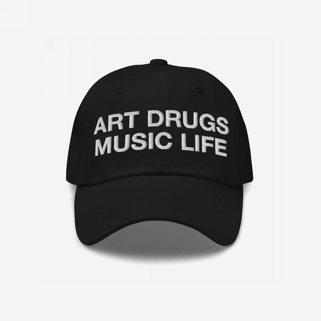 Black dad hat with the bold phrase ART DRUGS MUSIC LIFE embroidered in white, reflecting a manifesto for creativity and expression. Perfect for those embracing art and chaos.