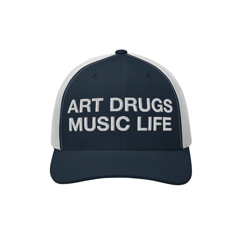 Art Drugs Music Life Hat: Navy trucker cap with bold white embroidery. Front reads “ART DRUGS MUSIC LIFE” in block letter