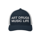 Art Drugs Music Life Hat: Navy trucker cap with bold white embroidery. Front reads “ART DRUGS MUSIC LIFE” in block letter