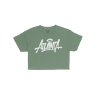 Atlanta Handstyle Women's Baby Tee featuring a white graffiti-style ANIMAL wordmark on a plain green, short-sleeved T-shirt, 